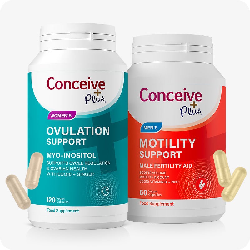 Conceive Plus Fertility Pack Ovulation & Motility Support featuring two supplement bottles—Women's Ovulation Support with a teal label and 120 vegan capsules, and Men's Motility Support with a red label and 60 vegan capsules—shown side by side with beige and yellow capsules, set against a clean white background.