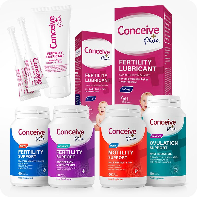 Conceive Plus Max Couples Fertility Bundle displayed with seven fertility products including men's and women's fertility support supplements, motility support, ovulation support, and fertility lubricants in both tube and applicator form, arranged on a white background with color-coded labels and packaging.