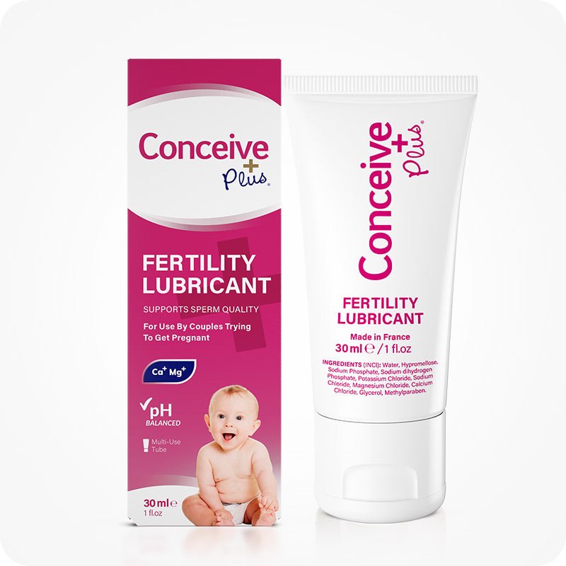 Image of a Conceive Plus try me size fertility lubricant 30ml box and tube on a white background. The box has pink and white label with white branding and tube is white with pink text. Box highlights sperm quality support, pH balance, calcium and magnesium ion content, quantity of lube, and multi-use feature.