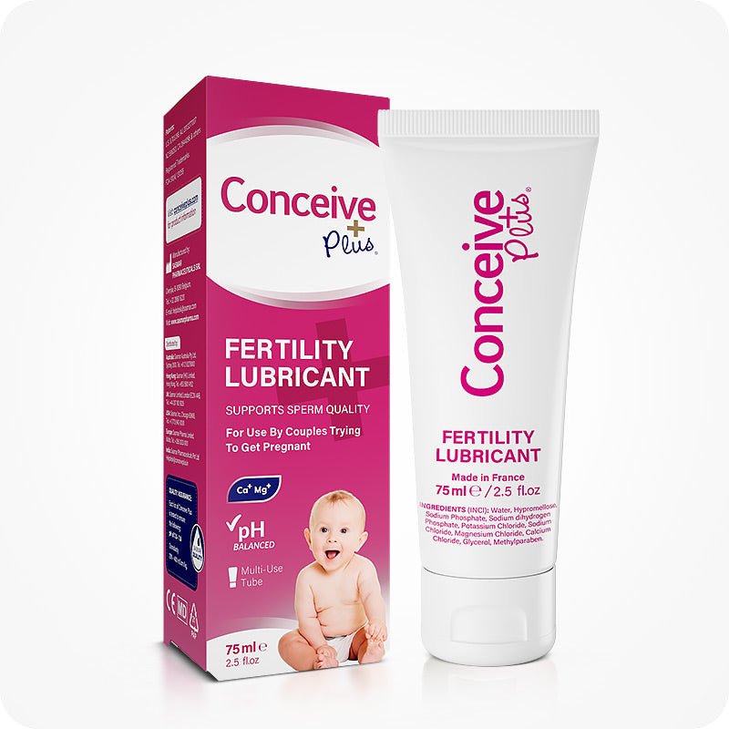 Image of Conceive Plus fertility lubricant tube 75ml and box on a white background. Pink box has white branding and text with highlight about sperm quality support, pH balance, multi-use feature, calcium and magnesium ion content, and lube quantity. White tube with pink branding and text. Tube is on the right side while box is on the left side.
